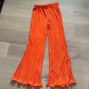 Show pictures orange plisse flared pants two piece set